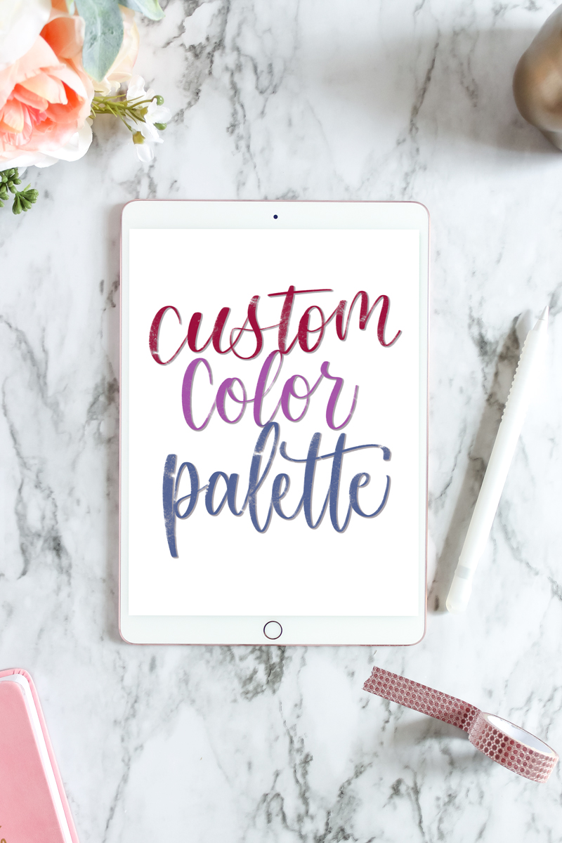ipad mockup with custom color palette in brush calligraphy on marble backdrop