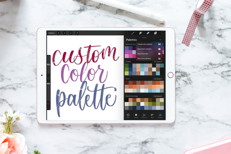 ipad mockup showing new color palette in Procreate, on a marble backdrop