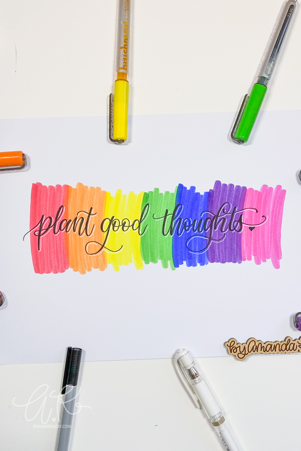 Plant good thoughts faux calligraphy on a rainbow backround